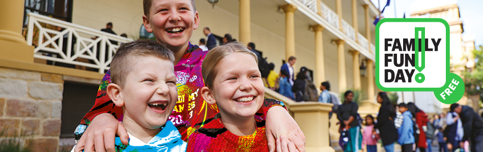 Children smiling at Family Fun Day